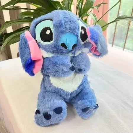 Peluche Stitch Anti Estrés Tu Compañero de Tranquilidad: adorables peluches en colores rosa y azul.